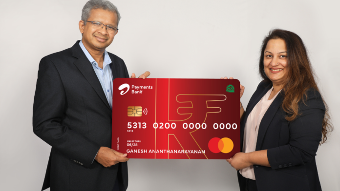 Airtel Payments Bank becomes the first Indian bank to launch a debit card made from eco-friendly material. This move aligns with the bank's commitment to sustainability within the financial sector. The debit cards will be made from r-PVC, , a certified eco-friendly materia. Adoption of this material will impact environmental preservation in the following ways: Carbon Emission: Each batch of 50,000 r-PVC cards will lead to a reduction of 350 kgs of carbon emissions. Hydrocarbon Usage: Production of r-PVC cards will result in a 43% decrease in hydrocarbon consumption. Water Conservation: The bank will conserve 6.6 million liters of water per batch of r-PVC cards. Card Variants and Offers Airtel Payments Bank will launch two cards - Personalised Classic Card and Insta Classic Card. Availability: The Personalised Card can be ordered through the Airtel Thanks app, and the Insta Card will be at select banking points. Offers: The cards include e-commerce benefits of up to INR 10,000 and One Dines in Indian cities. Upcoming Plans The bank has stated that it will introduce more cards made from eco-friendly materials. Airtel Payments Bank's launch of debit cards from eco-friendly material is a step towards sustainable banking practices in India. The initiative aligns with environmental concerns and adds value to the customer experience.